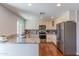 Modern kitchen featuring stainless steel appliances and granite countertops at 4815 E Kiva St, Phoenix, AZ 85044