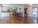 Open concept kitchen and dining area with modern cabinets and stainless steel appliances at 4815 E Kiva St, Phoenix, AZ 85044