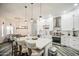 Bright kitchen with a white island and pendant lighting at 529 S Val Vista Rd, Apache Junction, AZ 85119