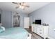 Bedroom with dresser and view of ensuite bathroom at 705 W Queen Creek Rd # 1059, Chandler, AZ 85248