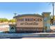 Community signage for The Bridges at Ocotillo at the neighborhood entrance at 705 W Queen Creek Rd # 1059, Chandler, AZ 85248