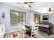 Dining area with a table, chairs, and a window overlooking the neighborhood at 705 W Queen Creek Rd # 1059, Chandler, AZ 85248