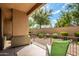 Charming covered patio with a view of the landscaped backyard at 705 W Queen Creek Rd # 1059, Chandler, AZ 85248