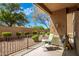 Charming covered patio with a view of the landscaped backyard at 705 W Queen Creek Rd # 1059, Chandler, AZ 85248