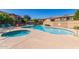 Exterior pool area with hot tub, sun loungers and manicured landscaping at 705 W Queen Creek Rd # 1059, Chandler, AZ 85248