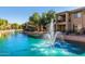 Exterior view of building exteriors and water feature fountain at 705 W Queen Creek Rd # 1059, Chandler, AZ 85248