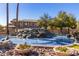 Picturesque water feature and community landscaping in The Bridges at Ocotillo at 705 W Queen Creek Rd # 1059, Chandler, AZ 85248