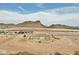 New home construction site with stunning mountain views and clear blue skies in a serene neighborhood at 740 W Patrick Pl, San Tan Valley, AZ 85143