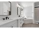 Elegant bathroom with double sinks, a soaking tub, and modern fixtures at 740 W Patrick Pl, San Tan Valley, AZ 85143