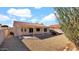 A lovely backyard with a covered patio and low maintenance landscaping at 9230 W Charleston Ave, Peoria, AZ 85382