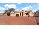 Charming single story home with a two car garage and well maintained desert landscaping at 9230 W Charleston Ave, Peoria, AZ 85382