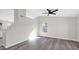 Inviting living room with gray wood-look floors and neutral paint palette at 9230 W Charleston Ave, Peoria, AZ 85382