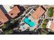 Overhead drone image showcasing community pool, hot tub, outdoor kitchen and gathering spaces at 10410 N Cave Creek Rd # 1032, Phoenix, AZ 85020