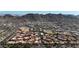 Expansive aerial view of a community nestled against the backdrop of majestic mountains in Arizona at 10410 N Cave Creek Rd # 1032, Phoenix, AZ 85020