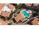 Drone shot of the community pool and surrounding landscaping and buildings at 10410 N Cave Creek Rd # 1032, Phoenix, AZ 85020