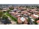 A sweeping aerial perspective captures an expansive view of neighborhood with neat rows of houses, and community facilities at 10410 N Cave Creek Rd # 1032, Phoenix, AZ 85020