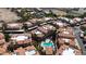 Aerial view showcasing condo community layout, lush greenery, and a refreshing pool area at 10410 N Cave Creek Rd # 1032, Phoenix, AZ 85020