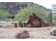 Sign for Phoenix Mountains Preserve at North Mountain Park with native cacti and desert landscape at 10410 N Cave Creek Rd # 1032, Phoenix, AZ 85020