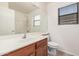 Bathroom with large mirror, tiled floor, and shower-tub combination at 13913 N 133Rd Dr, Surprise, AZ 85379