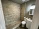 The bathroom features a stand up tile shower, modern vanity, and contemporary design at 14024 W Noble Cir, Casa Grande, AZ 85122