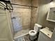 This bathroom features tile flooring, a shower and a vanity sink at 14024 W Noble Cir, Casa Grande, AZ 85122