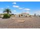 Expansive backyard with desert landscaping, perfect for low-maintenance living and enjoying the Arizona sunshine at 14215 N Boswell Blvd, Sun City, AZ 85351