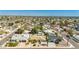 This is an aerial image displaying a neighborhood and the home, which features both a pool and putting green at 14433 N 37Th St, Phoenix, AZ 85032