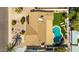 An aerial view of the home, showcasing the backyard pool, putting green and well-maintained roof at 14433 N 37Th St, Phoenix, AZ 85032