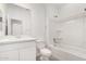 Clean bathroom with a vanity and a shower and tub combo at 16804 W Yucatan Dr, Surprise, AZ 85388