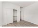 Bedroom with a closet, neutral walls, and bright, natural light at 16804 W Yucatan Dr, Surprise, AZ 85388