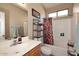 Functional bathroom with a clean, neutral color scheme and a shower-tub combination at 1765 N Agave St, Casa Grande, AZ 85122