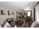 Spacious living room showcasing neutral walls, plush seating, and a large flat-screen TV for cozy entertainment at 1765 N Agave St, Casa Grande, AZ 85122