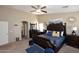 Spacious main bedroom with a vaulted ceiling, a decorative bed and matching furniture at 1765 N Agave St, Casa Grande, AZ 85122