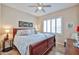 Relaxing main bedroom featuring a plush bed, ample lighting, and a serene atmosphere for comfortable sleep at 19437 N Guardian Ln, Surprise, AZ 85387