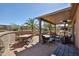 Covered patio featuring outdoor dining and seating areas at 19437 N Guardian Ln, Surprise, AZ 85387