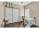 Cozy bedroom featuring laminate wood floors and closet with sliding doors at 2015 S 80Th Ln, Phoenix, AZ 85043