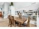 Dining area adjacent to a balcony overlooking living space at 2015 S 80Th Ln, Phoenix, AZ 85043