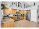 Well-equipped kitchen featuring stainless steel appliances and abundant cabinet storage at 2015 S 80Th Ln, Phoenix, AZ 85043