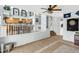 Open-concept living room featuring decorative tile flooring and staircase with railing at 2015 S 80Th Ln, Phoenix, AZ 85043