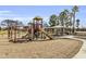 Community playground with slides, swings, and a covered picnic area for families at 2015 S 80Th Ln, Phoenix, AZ 85043