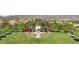 Aerial view of a Primary-planned community showcases lush landscaping, mountain views and neighborhood charm at 20646 W Delaney Dr, Buckeye, AZ 85396