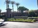 Verado Golf Club entrance sign complemented by manicured landscaping and desert modern architecture at 20646 W Delaney Dr, Buckeye, AZ 85396