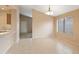 Bright dining area with tile flooring, chandelier, and plenty of natural light at 3151 W Donald Dr, Phoenix, AZ 85027