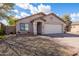 Charming single-story home with desert landscaping, attached garage, and inviting entryway at 3151 W Donald Dr, Phoenix, AZ 85027