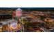 Aerial view of Gilbert water tower over the city skyline and streets with evening lights at 331 W Stanford Ave, Gilbert, AZ 85233