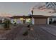 Charming single-story home with a brick pathway and well-maintained desert landscaping at 331 W Stanford Ave, Gilbert, AZ 85233