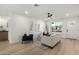 Stylish living room with a ceiling fan, neutral paint, and hardwood floors at 331 W Stanford Ave, Gilbert, AZ 85233