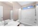 Bathroom with a shower-tub combo, modern fixtures, and bright lighting at 34717 N Picket Post Dr, San Tan Valley, AZ 85144