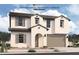 Charming two-story home featuring a Spanish style roof and tan stucco exterior with an attached two car garage at 36923 W Santa Maria St St, Maricopa, AZ 85138