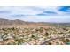 An expansive aerial shot showing the community with desert views in the background at 3826 E Equestrian Trl, Phoenix, AZ 85044